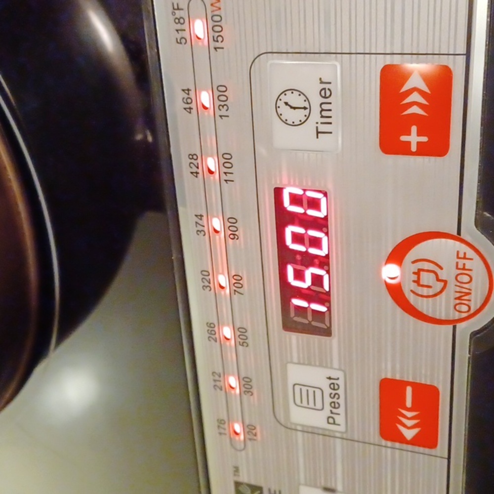Push button induction cooker - Picture 9 of 11